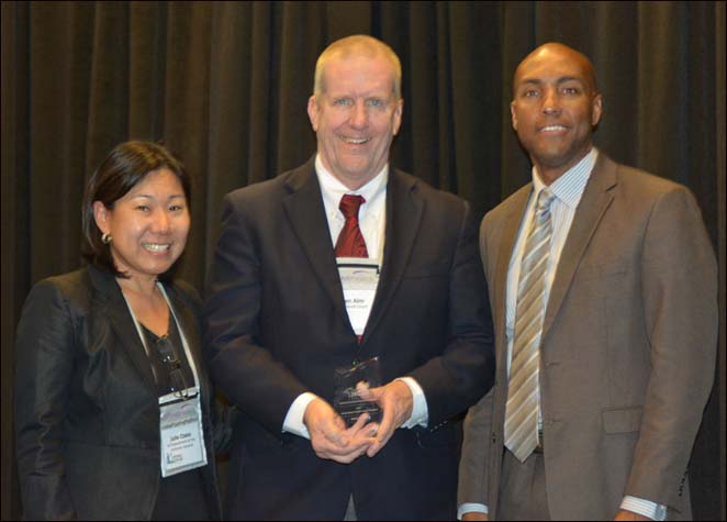 First Circuit Court Judge Steven Alm was honored by the National Criminal Justice Association with its Outstanding Criminal Justice Program Award for the Western Region. Pictured above: Julie Ebato, Administrator, Hawaii Department of the Attorney General, Crime Prevention and Justice Assistance Division (left), Judge Steven Alm (center), and Karhlton Moore, NCJA’s Vice President and Executive Director of the Ohio Office of Criminal Justice Services (right).