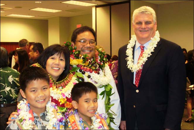 Pictured with Judge Nakamoto and Chief Justice Recktenwald are Judge Nakamoto’s wife, Joyce, and sons Timothy (age 11) and Jordan (age 9).