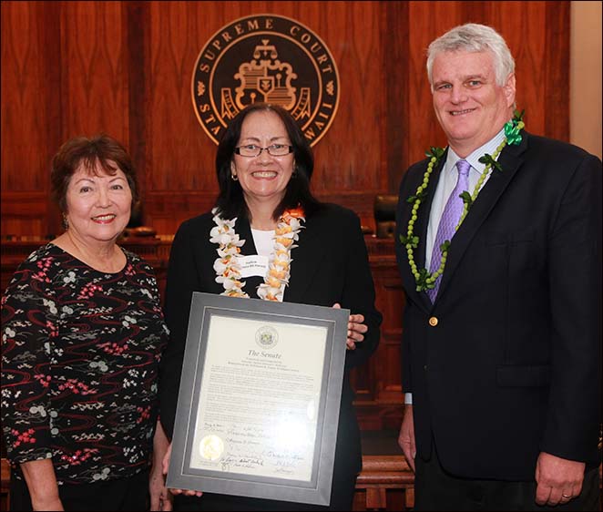 At the opening of the Hawaii State Bar Association's (HSBA) Appellate Section's Annual Meet and Greet, Chief Justice Mark E. Recktenwald (right) recognized Supreme Court Associate Justice Sabrina S. McKenna (center) as the recent recipient of the Daniel K. Inouye Trailblazer Award.  Senator Michelle N. Kidani (left) presented Justice McKenna with a certificate signed by the members of the Hawaii State Senate