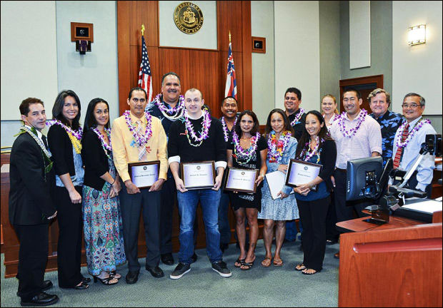 The nine graduates of the Kauai Drug Court take a group photo with well-wishers.