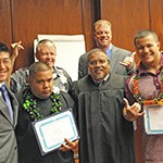 Judge Domingo and 3 attorneys congratulate 2 DWI Court graduates April 21, 2016.