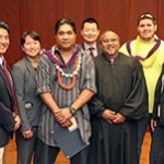 Two DWI Court graduates with judge and others.