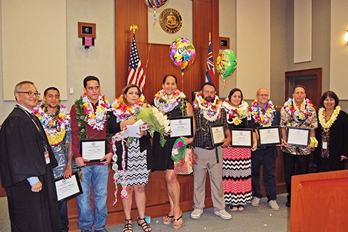 Photograph of eight Kauai Drug Court Graduates.