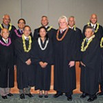 Chief Justice Mark Recktenwald and 12 judges from the Third Circuit pose for photo with Judge Nagata in a Hilo courtroom.