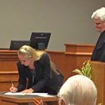 Judge Frenz signs the oath of office 10/31/2016.