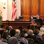 Intermediate Court of Appeals Chief Judge Craig H. Nakamura at the Supreme Court podium. At the bench, Associate Justice Richard Pollack, Associate Justice Paula A. Nakayama, and Chief Justice Mark E. Recktenwald.