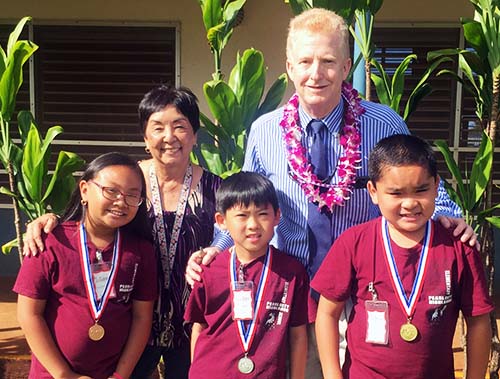 Judge Browning congratulates students who participated in the Judiciary's annual poster contest.