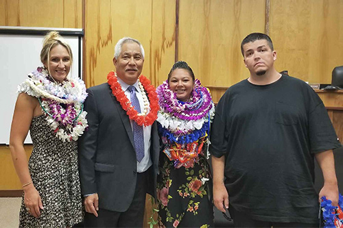 Judge Melvin Fujino with three Drug Court graduates in the Kona Drug Court courtroom, 05/07/18.