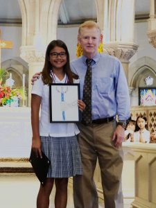 2018 First Circuit Law Day Art contest winner, Brooke Jones (first place). in Fourth-Fifth grade category is pictured here with Chief Judge R. Mark Browning.