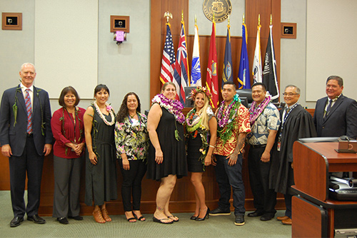 Associate Justice Michael Wilson, Judge Kathleen Watanabe, Chief Judge Randal Valenciano, and Deputy Chief Judge Michael Soong with six graduates of the Kauai Drug Court Program, in front of the 5th Circuit courtroom bench, 05/18/2018.