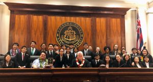 Photo of Chief Justice Mark E. Recktenwald and the Moanalua High School Blue team.