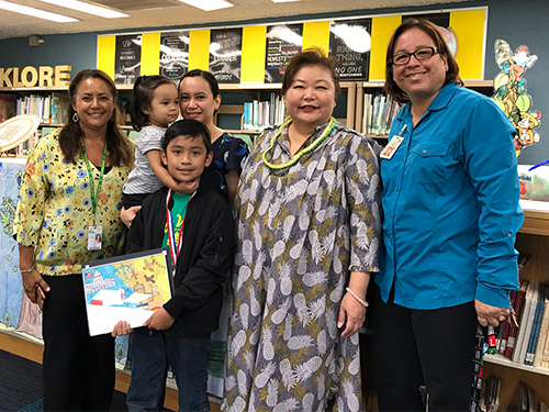 2019 First Circuit Law-Day Poster Contest 3rd place winner Enzo Miguel DeLeon, teacher Stacy Batoon, Enzo’s family, First Circuit Chief Court Administrator Lori Okita, and Principal Michelle DeBusca.