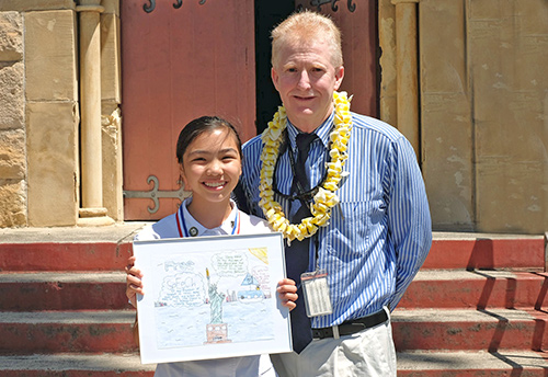 2019 First Circuit Law-Day Poster Contest first place winner Morgyn Bunton and First Circuit Chief Judge R. Mark Browning.