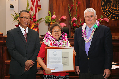 Yee Nin Evelyne Luk, Court Administrator of the Legal Documents Branch in the First Circuit’s Honolulu District Court, with Intermediate Court of Appeals Associate Judge Derrick H.M. Chan and Hawaii Supreme Court Chief Justice Mark E. Recktenwald, in the Supreme Court courtroom, 09/30/2019.