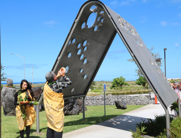 Kahu Danny Akaka, Jr., and daughter, Kalei, bless the Creating Kamaʻāaina sculpture by Matthew Salenger, 10-01-2019.