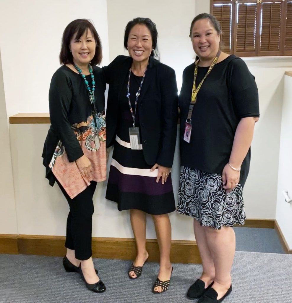 Photo of: From left, volunteer attorney Ann Isobe, State Law Librarian Jenny Silbiger, and Librarian Marlene Cuenco.