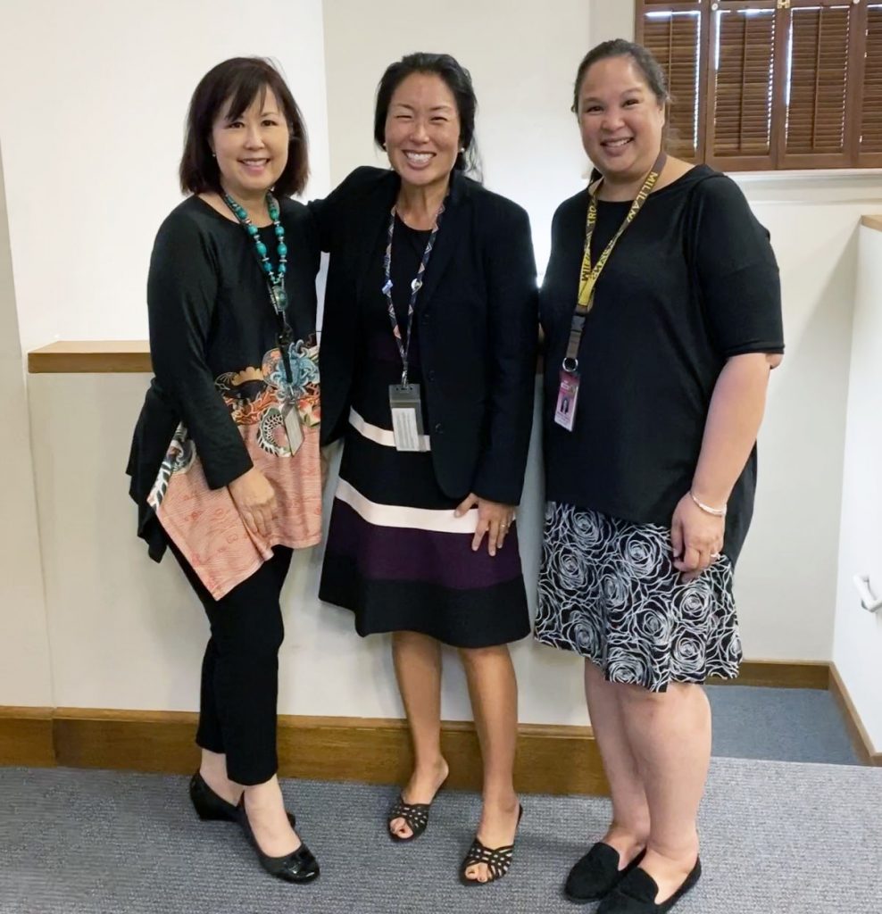 Photo of:  From left, volunteer attorney Ann Isobe, State Law Librarian Jenny Silbiger, and Librarian Marlene Cuenco.