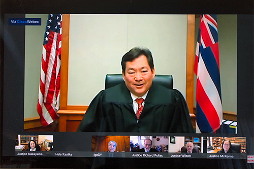 Image from the YouTube livestream of Judge Peter K. Kubota at the bench with livestream images of other Hawaii Supreme Court justices and Gov. David Y. Ige looking on from their remote locations.