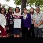 Hawaii State Rep. Richard Onishi, Rep. David Tarnas, Rep. Jeanne Kapela, Sen. Joy San Buenaventura, Judge Nagata, Sen. Lorraine Inouye, Rep. Nicole Lowen, Rep. Mark Nakashima, and Hawaii Supreme Court Chief Justice Mark Recktenwald, stand in front of the Patsy T. Mink statute outside the Hawaii State Library, 03/08/2022.