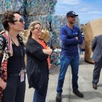 Judge Wendy DeWeese, Deputy Prosecutor Annaliese Wolf, and Deputy Public Defender Rick Macapinlac stand in front of large blocks of recycled material as they learn about the recycling process from Atlas Recycling Center Operations Manager Elias Allen, 05/02/2022.