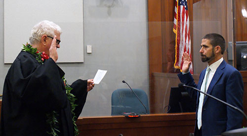 Image of Gregory Meyers, right, being sworn in as District Court Judge of the Fifth Circuit by Chief Justice Mark Recktenwald.
