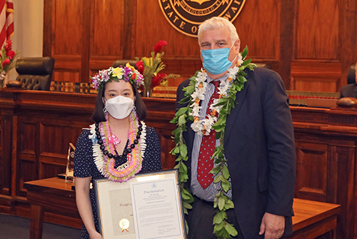 Iris Lim, DWI Court Coordinator, First Circuit (Oahu) Honolulu District Court, with Hawaii Supreme Court Chief Justice Mark E. Recktenwald in front of the Supreme Court courtroom bench, 09/23/2022.