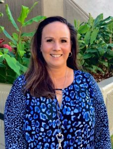 A photo of Danielle “Keala” Pellazar, Court Documents Supervisor, Second Circuit (Maui County) Legal Documents, outside of the Hoapili Hale Courthouse on Maui.