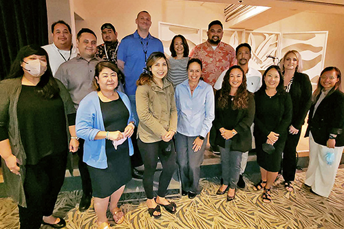 Group photo of the First Circuit Drug Court Team members at the Statewide Adult Drug Court Conference, Ala Moana Hotel corridor, September 1.