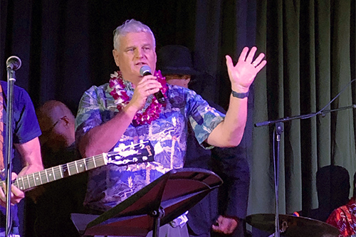 Hawaii Supreme Court Justice Mark Recktenwald on the microphone at Rock for Justice at Artistry Kakaako, 11/10/2022
