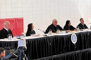 Hawaii Supreme Court Justices at the bench in the Lahainaluna High School gymnasium, 12-06-2022.