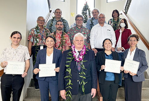 Image of First row, left: Sean Hartilieb, Emiko Meyers, Chief Justice Recktenwald, Kimberly Torigoe (Kauai Bar President), and Laura Barzilai (County Attorney’s Office). Second row: Chief Judge Randal Valenciano, Judge Greg Meyers, Todd Dickerson (OPA), Keola Siu (OPA, 1st Deputy) and Jennifer Win (OPA). Third row: Judge Glen Hale, Judge Robert Goldberg, and Judge Kathleen Watanabe.