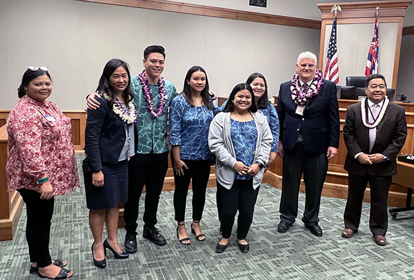 Image of from left, Raquel Gali, Judge Darien Ching Nagata, Kekoa Abellera, Tianna Webster, Precious Ahulau-Kaleo, Melissa Mayo, Chief Justice Mark Recktenwald, and Chief Judge Robert Kim.