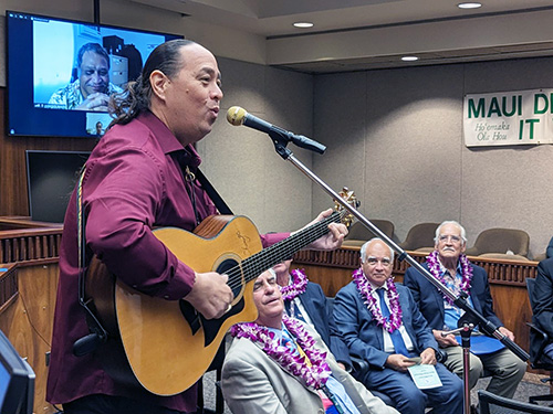 Image of David "Kawika" Ortiz, Second Circuit Program Specialist, serenading the audience with "Over the Rainbow/What a Wonderful World".