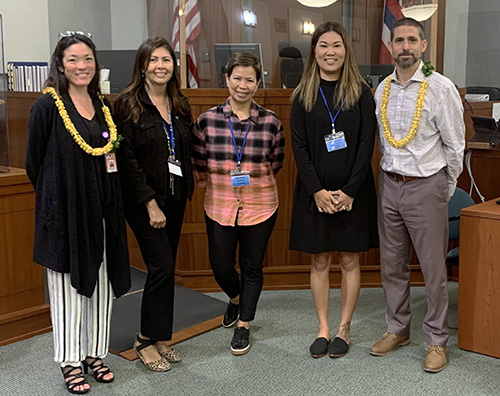 Image of: From left, Judge Stephanie R. S. Char, Karla Huerta, Program Director, Kauai Children’s Justice Center, Maria “Mia” McNeil, Secretary, Kauai CJC, Kelcie Morita, Forensic Interviewer, Kauai CJC, andJudge Gregory H. Meyers.