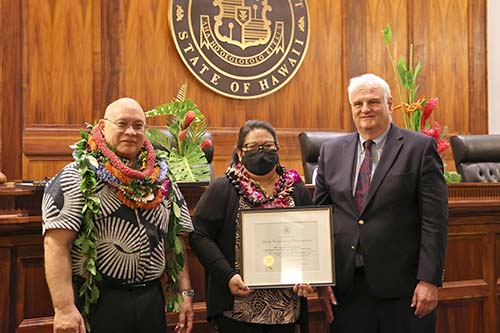 Administrative Director of the Courts Rodney Maile, Hilo Legal Documents Branch representative Traci Kanaeholo, and Hawaiʻi Supreme Court Chief Justice Mark Recktenwald in front of the Hawaiʻi Supreme Court courtroom bench, 09/29/2023.