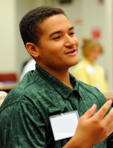 Image of Keoni Randolph as he engages with his fellow students.