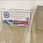 Menstrual product dispenser in restroom at Hale Hilinaʻi, March 2025.