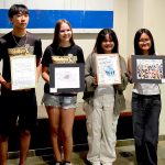 Hawaiʻi’s Fifth Judicial Circuit 2025 Law Day Art Contest winners holding their artwork. From left: Chiefess Kamakahelei Middle School eighth grade students Araceli Ringor, Logan Manibog, and Naomi Gallagher, with Kauaʻi High School Grade 9 students Pagiel Ramire and Czamantha Tabil, and Fifth Circuit District Court Judge Gregory H. Meyers, 05/13/2025.