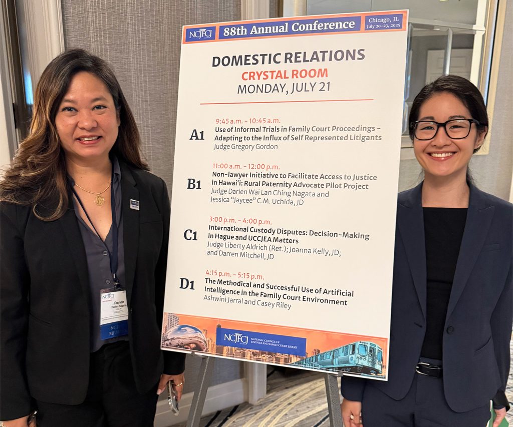 Third Circuit District Family Court Judge Darien Nagata and Legal Aid Society of Hawaii Senior Attorney Jessica Jaycee Uchida stand on either side of a sign titled "Domestic Relations" that provides information on presentations, including theirs, at NCJGCJ in Chicago, 07/21/2025.