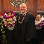 Gov. Josh Green and Chief Justice Mark Recktenwald pose for photographs in the Supreme Court Courtroom with newly sworn in Judges Nakasone, Holma, and Tomasa.